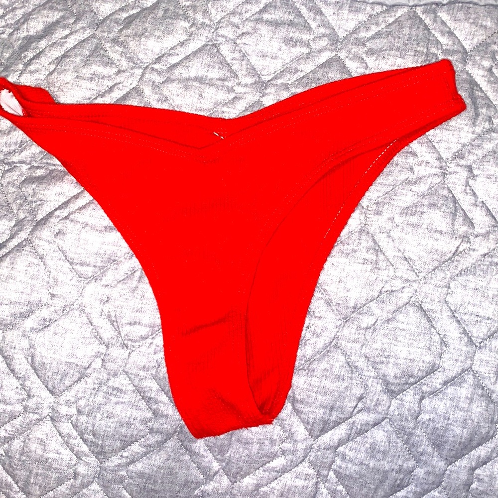 Red high cut bikini bottoms. Size small